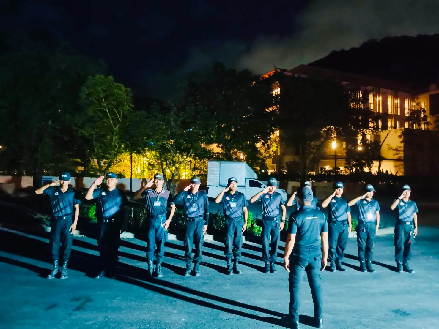 SGS night shift saluting the supervisor before posting at MontAzure, Kamala